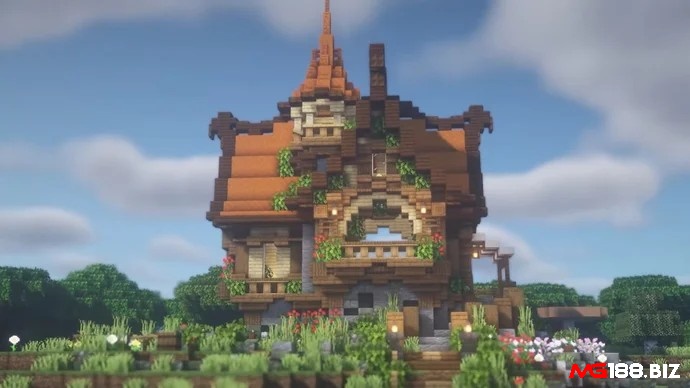 Nhà fantasy trong Minecraft với mái cao, đèn treo và kiến trúc cổ tích giữa khu rừng